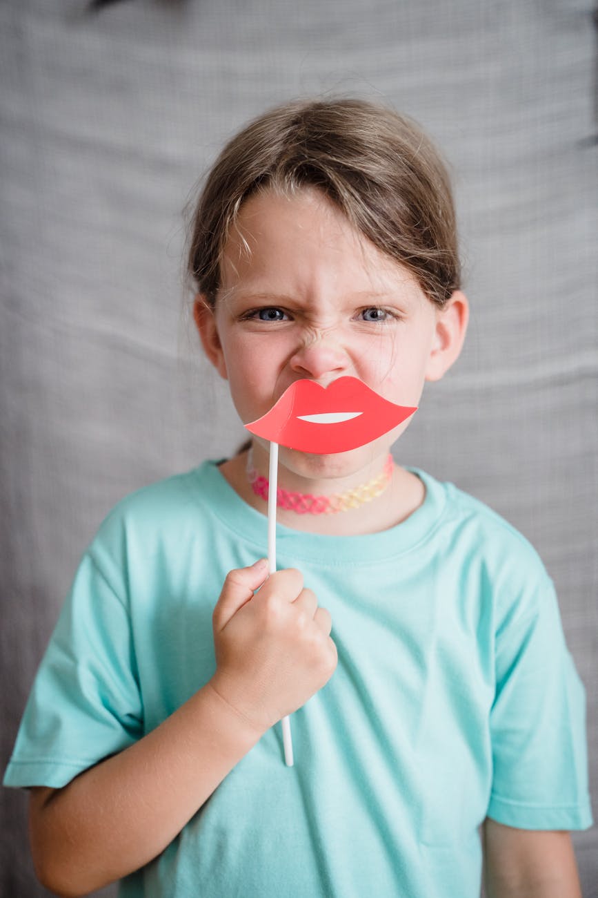child with a fake mouth